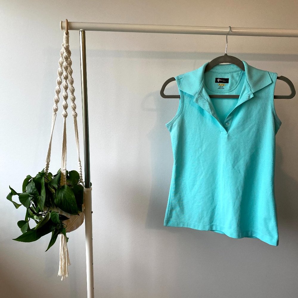 Sold-Greg Norman Play Dry Sleeveless Polo
